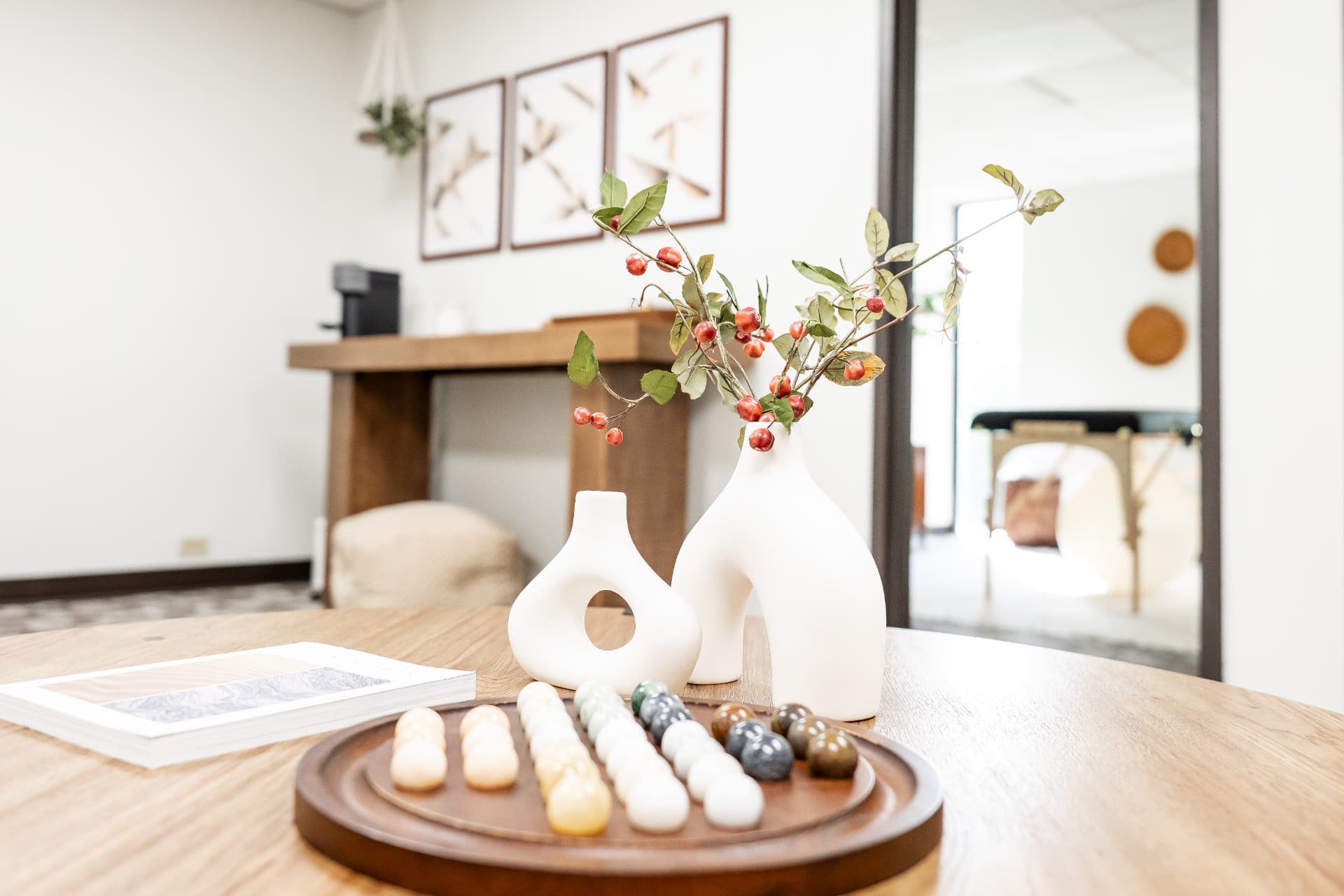 A tabletop display with natural decor overlooking the Missal Wellness studio.